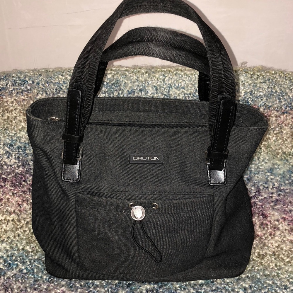 Proton Australia. Charcoal grey purse.